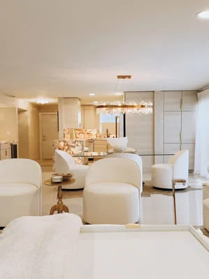 Modern bathroom with floating vanity, frameless mirror, and concrete flooring
